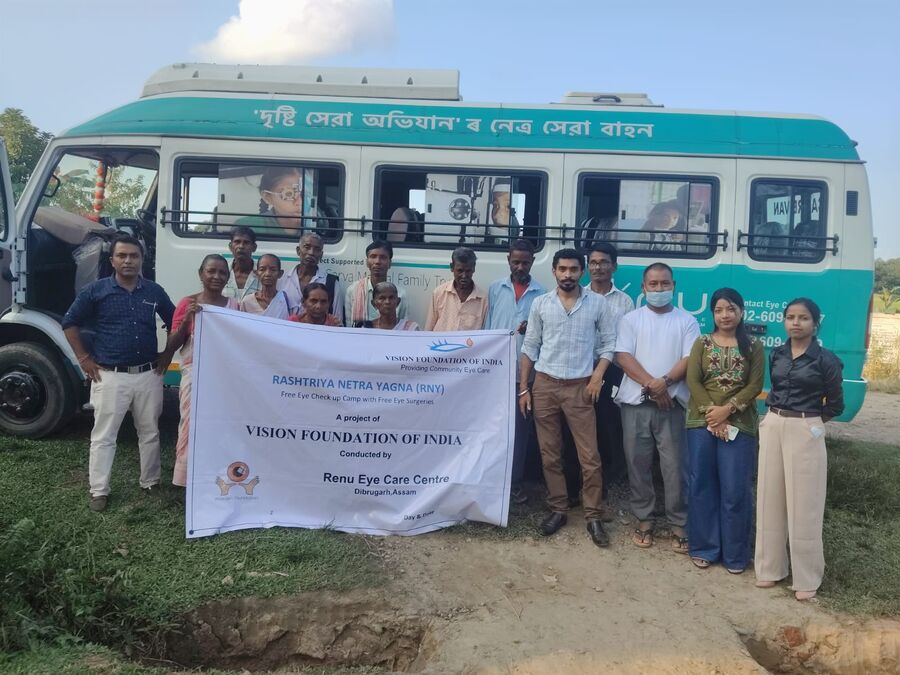 Camp team and patients with the eye care van